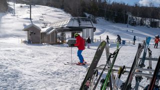 Skiers at Attitash resort in NH