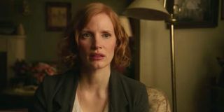 Beverly Marsh (Jessica Chastain) looks concerned while sitting in a living room in 'IT Chapter Two'