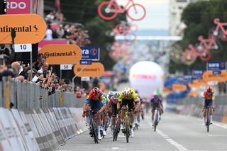 TIRANA ALBANIA MAY 09 LR Mads Pedersen of Denmark and Team Lidl Trek and Wout Van Aert of Belgium and Team Visma Lease a Bike sprint at finish line to win the stage during the 108th Giro dItalia 2025 Stage 1 a 160km stage from Durres to Tirana UCIWT on May 09 2025 in Tirana Albania Photo by Dario BelingheriGetty Images