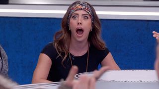 Dee with her mouth wide open in surprise.