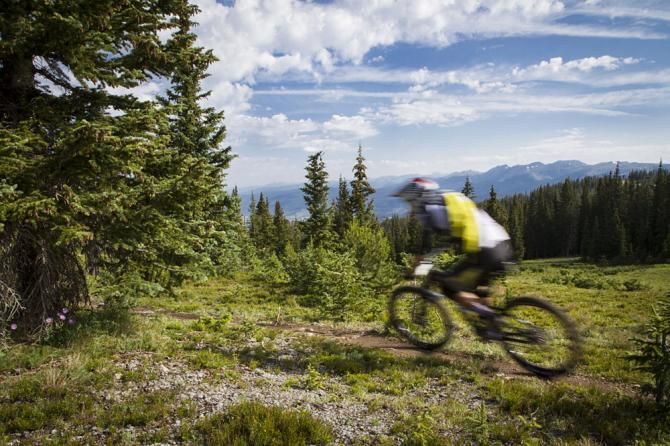 A racer flies by in a blur