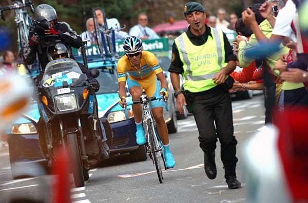 But the American was chased by his team-mate, Alberto Contador