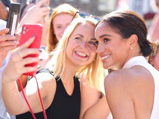Meghan, Duchess of Sussex meets members of the public outside the town hall during the Invictus Games Dusseldorf 2023 - One Year To Go events, on September 06, 2022 in Dusseldorf, Germany.