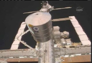 Orbital Delivery: Shuttle Crew Installs Fresh ISS Cargo Pod