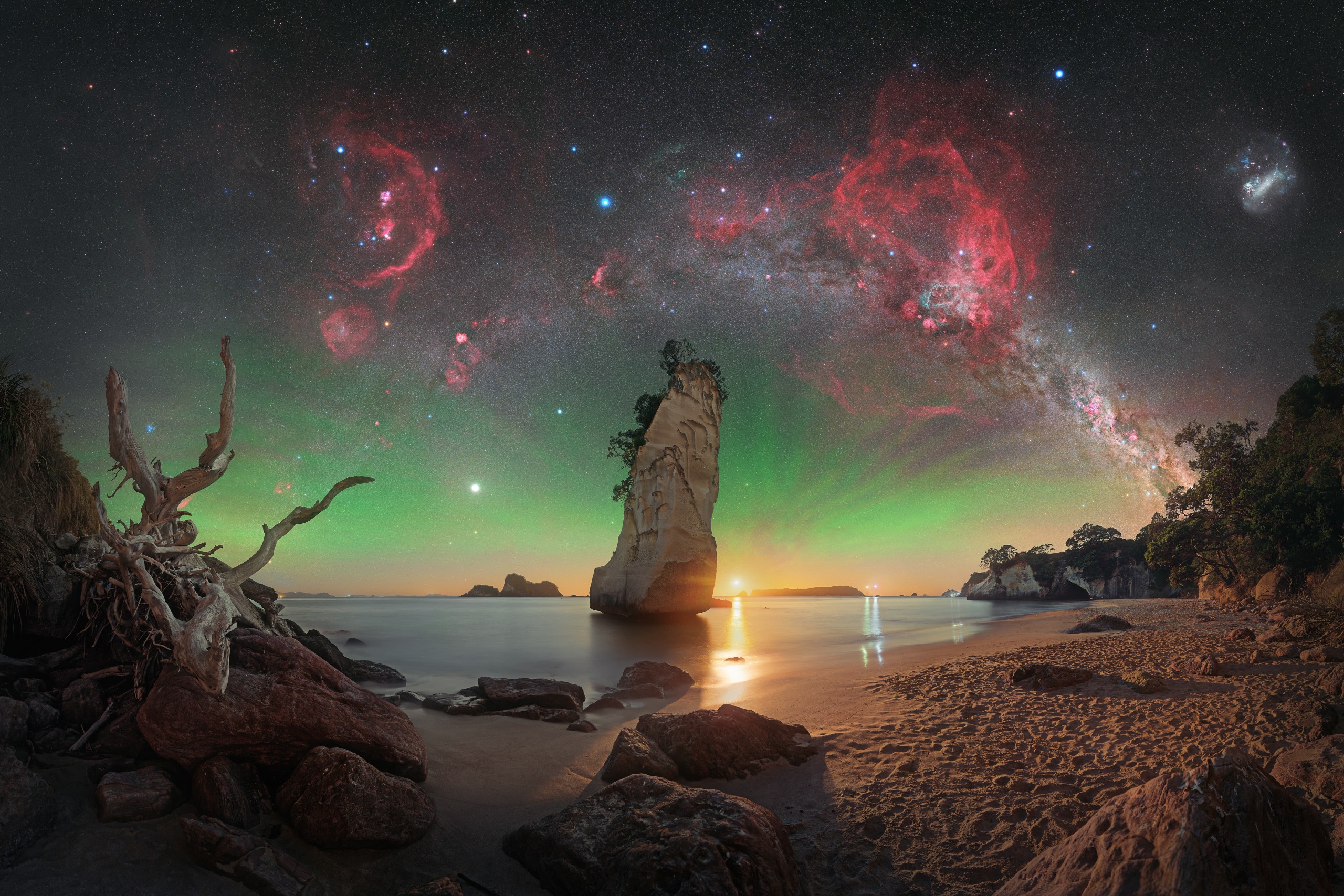 This is a multilayer 24 panel mosaic taken from Cathedral Cove before and during a moonrise.
