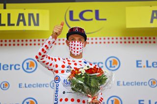 QUILLAN FRANCE JULY 10 Michael Woods of Canada and Team Israel StartUp Nation Polka Dot Mountain Jersey celebrates at podium during the 108th Tour de France 2021 Stage 14 a 1837km stage from Carcassonne to Quillan LeTour TDF2021 on July 10 2021 in Quillan France Photo by Tim de WaeleGetty Images