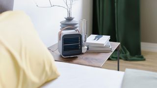 Cooling fan on bedside table to show how to cool down a room without ac