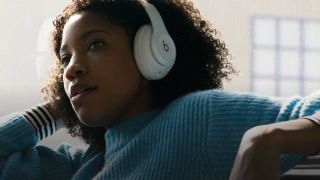 Woman wearing Beats Studio 3 Wireless, one of the best Apple headphones