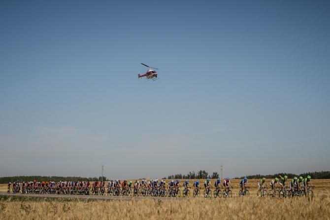 The peloton gets strung out for the TV coverage.