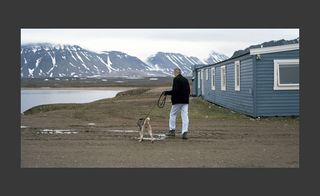A man walking with the dog