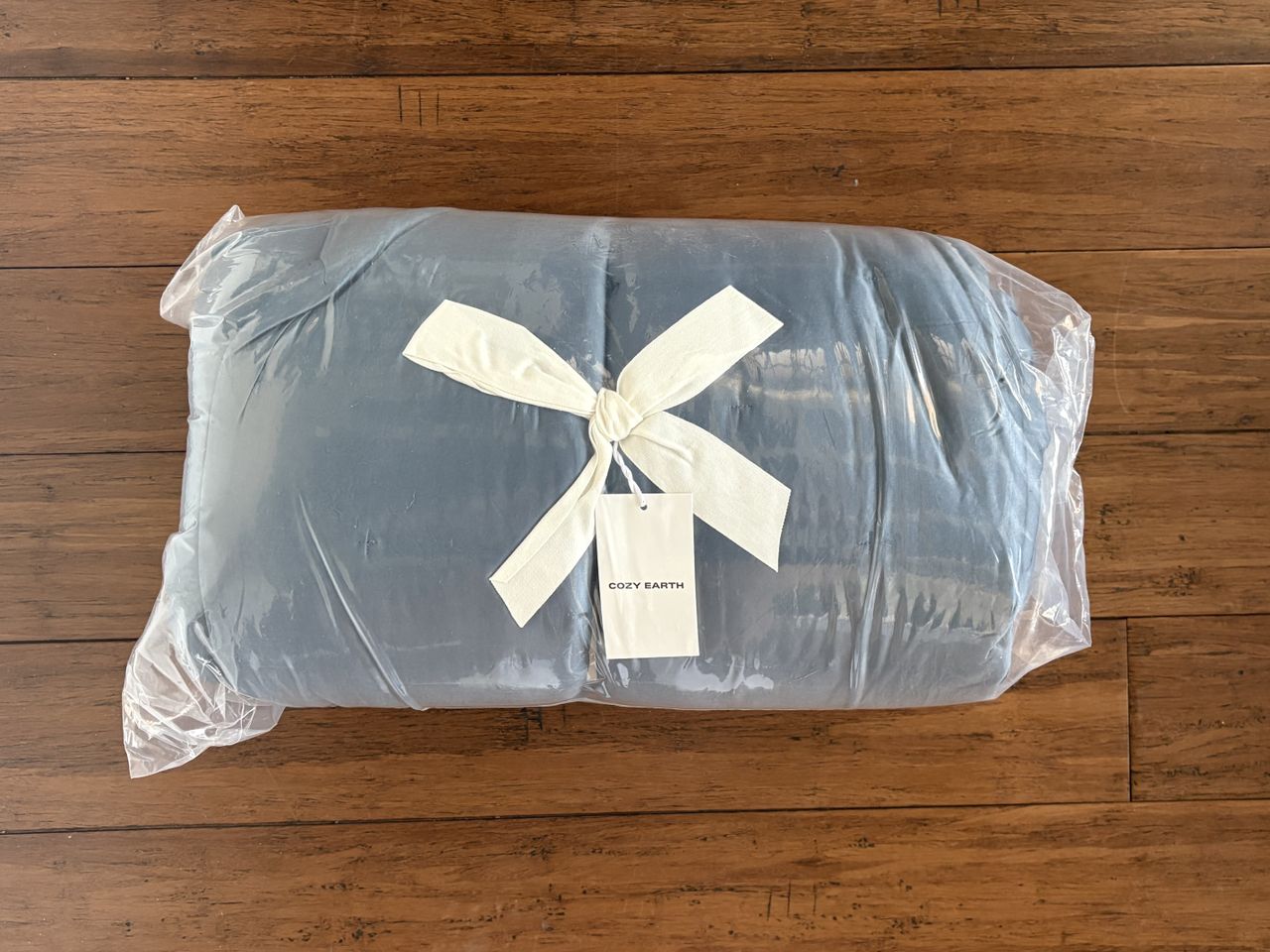a product from cozy earth wrapped in a bow