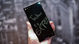 Samsung Galaxy S24 Ultra showing writing on lock screen "taken to Extreme"