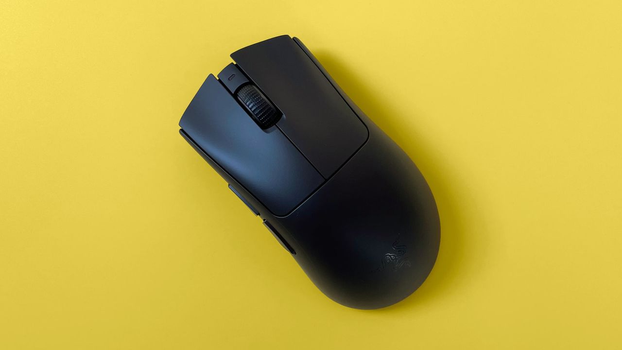 A Razer DeathAdder V3 HyperSpeed mouse against a yellow background.