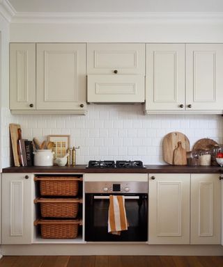 Neutral kitchen with basket shelves that pull out