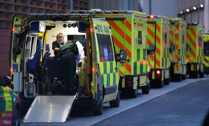 Ambulance workers at hospital