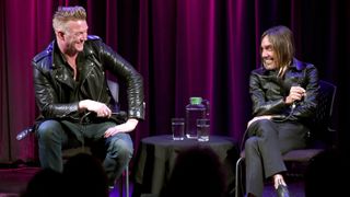 Musician Josh Homme (L) and singer Iggy Pop speak onstage at the Grammy Museum on April 27, 2016 in Los Angeles, California. 