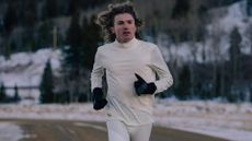 Best winter running gear: person running in the cold wearing Tracksmith apparel