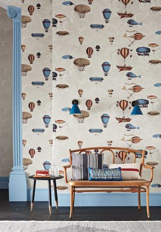 patterned wallpaper with hot air balloons in a living room