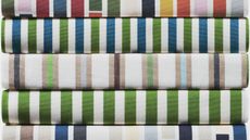 Pile of fabrics with striped design