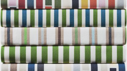 Pile of fabrics with striped design