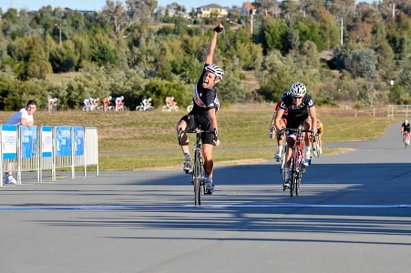 Michael Fitzgerald (Plan B) celebrates a well-timed sprint to beat Alistair Loutit (McDonagh Blake-Witness) in Saturday's 109km race.