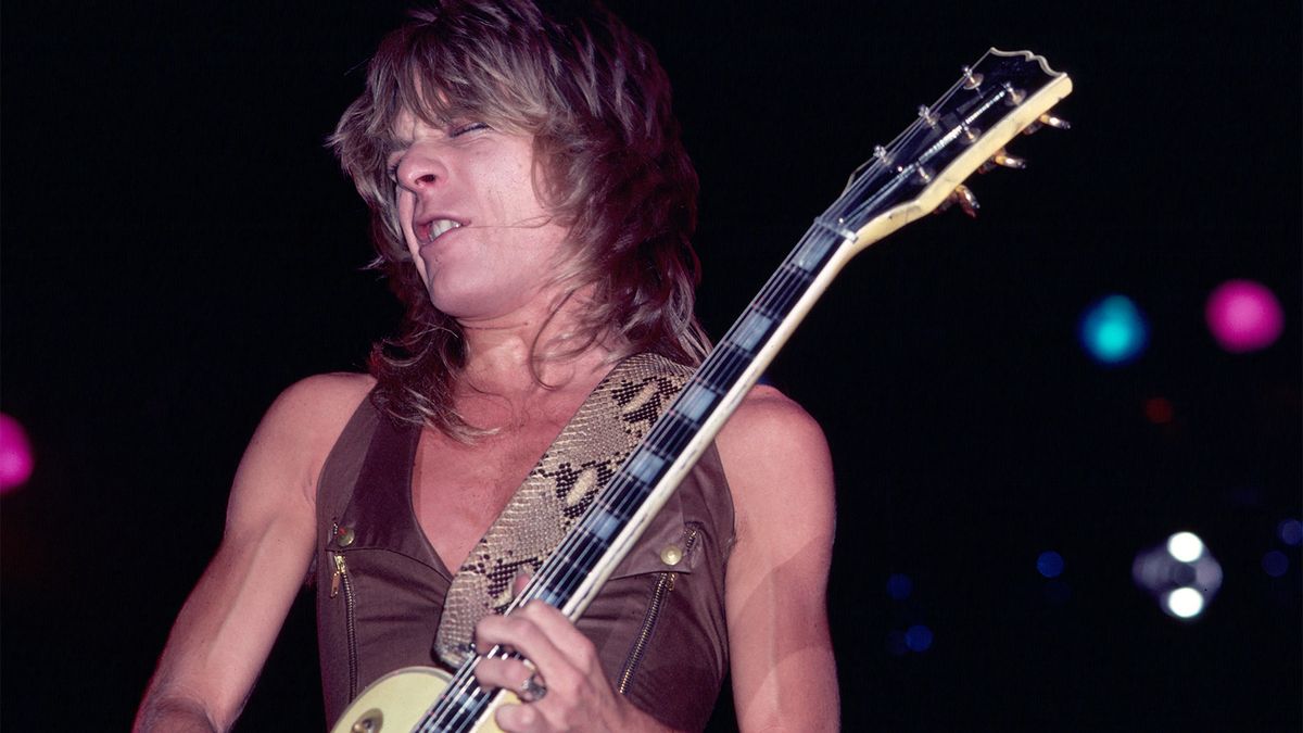 American Heavy Metal musician Randy Rhoads (1956-1982) plays guitar as he performs, during the &#039;Blizzard of Ozz Tour,&#039; at Nassau Coliseum, Uniondale, New York, August 14, 1981. It was Ozzy Osbourne&#039;s debut concert tour as a solo artist after having been fired by the English group Black Sabbath the year prior. 