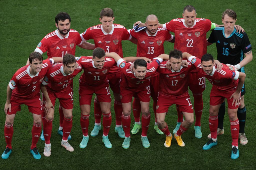 The Russian football team posing for a picture before their match with Denmark.