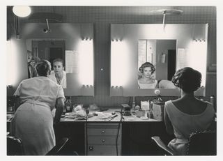 Ingrid Thulin and Gunnel Lindblom, the actresses playing Ester and Anna, in their dressing room