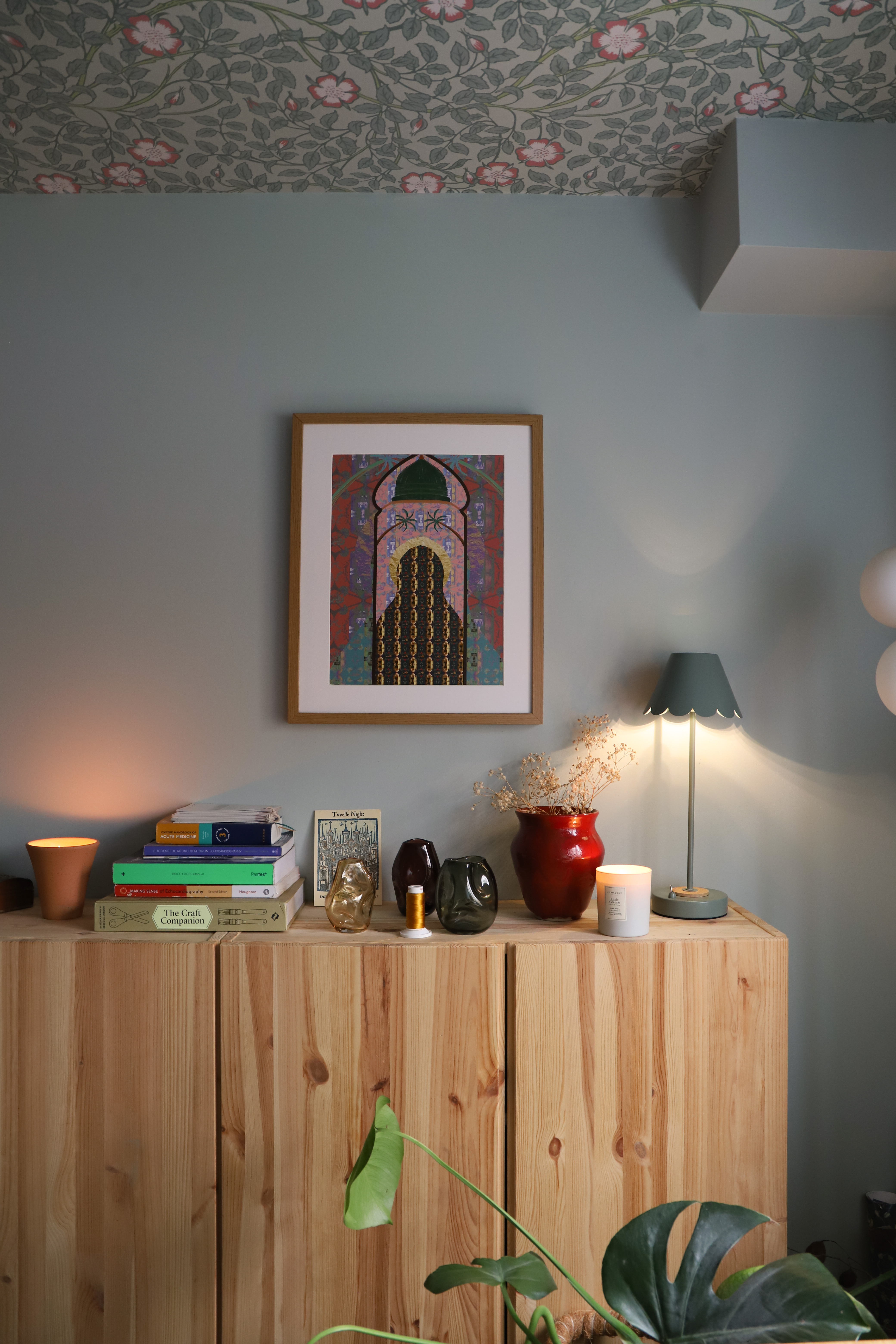 Richly layered interiors and exteriors shots of environments decorated with contrasting patterns, plush textiles, framed original artwork, pastel palettes, and plenty of natural light.