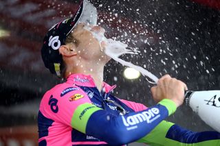 Sacha Modolo soaks himself with victory champagne.