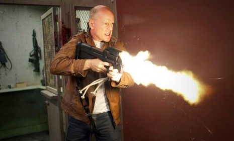 Bruce Willis thrills viewers in the briefest of brief teasers for his upcoming movie &amp;quot;Looper.&amp;quot;