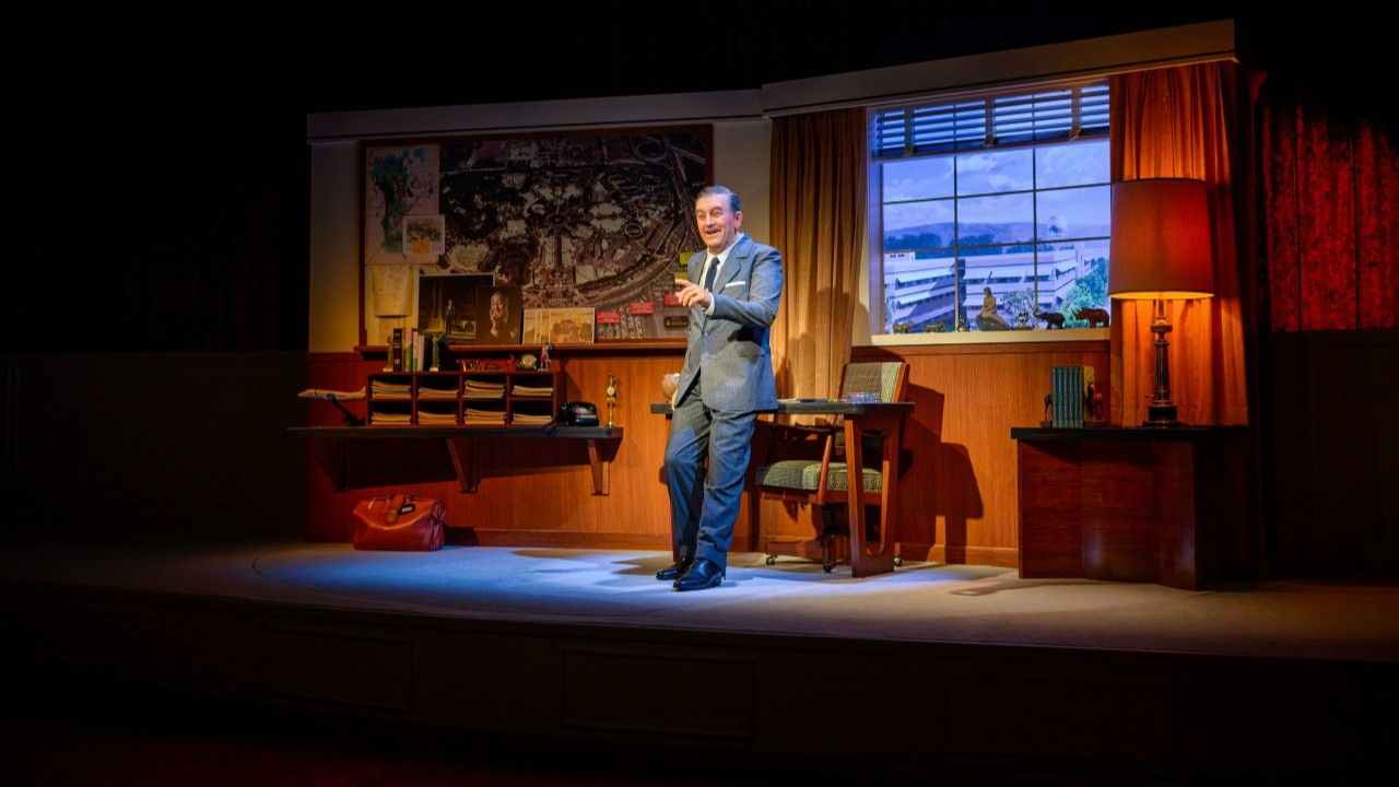 Walt Disney animatronic leaning on desk