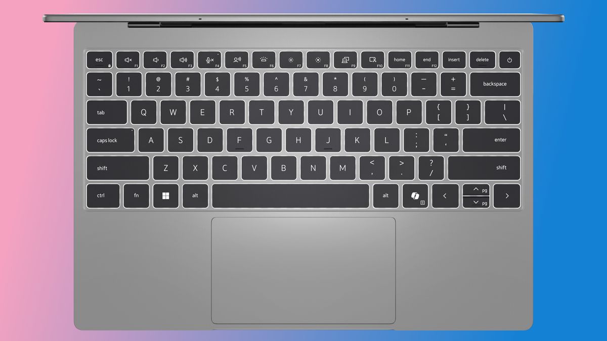 Top view of an XPS 13 laptop keyboard with black keys on a silver base.