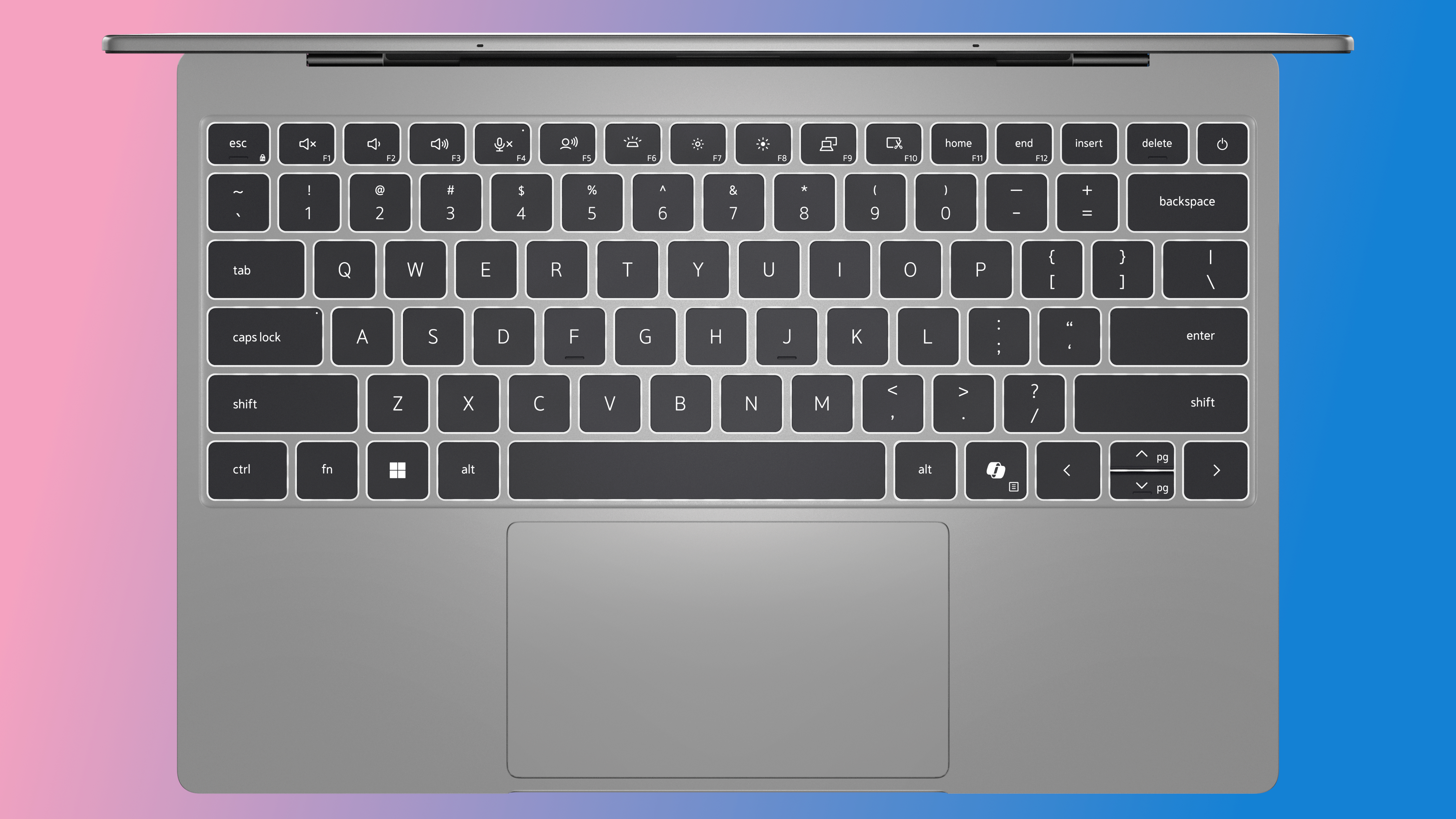 Top view of an XPS 13 laptop keyboard with black keys on a silver base.