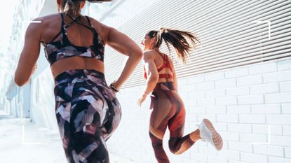 Women running outdoors together