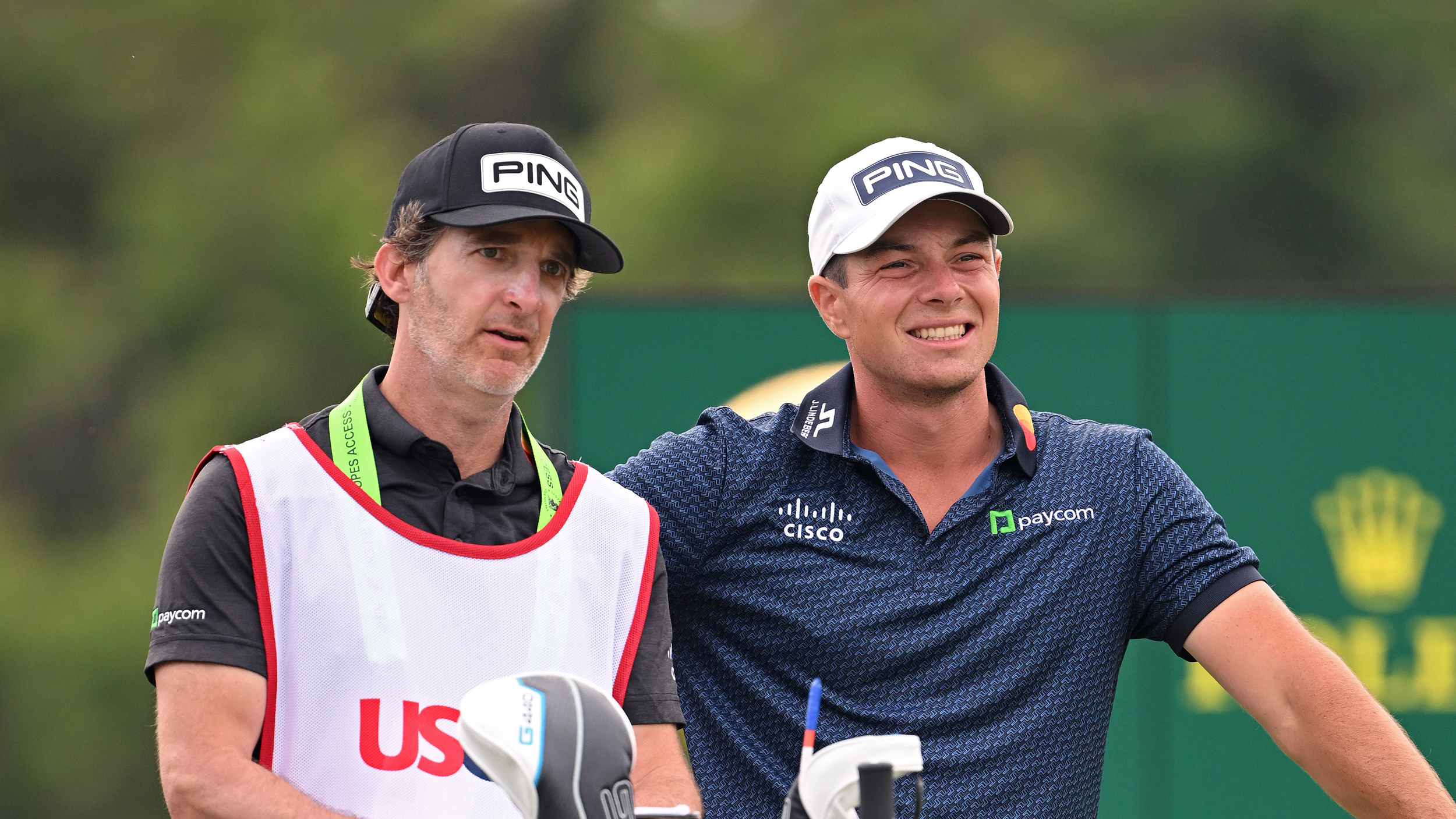 Caddie Shay Knight (left) and Viktor Hovland discuss a shot during the 2025 US Open at Oakmont