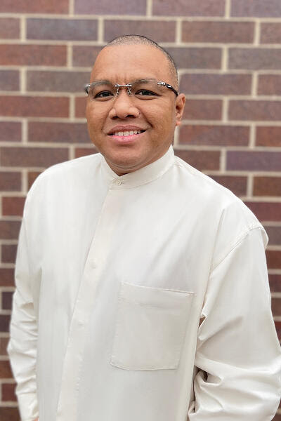 A smiling man's headshot for Williams AV.