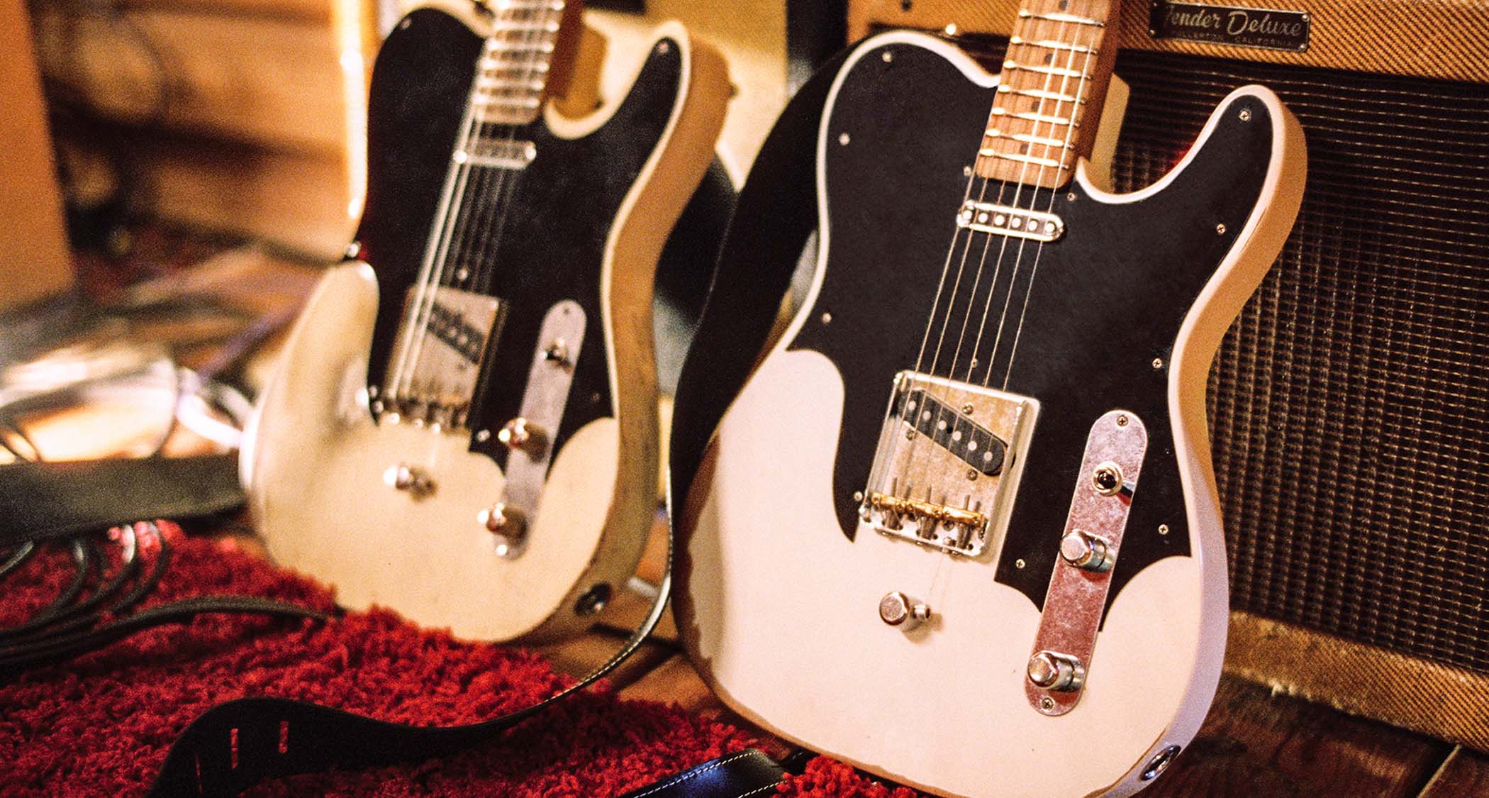 The Fender John Osborne Telecaster comes factory modded with a B-Bender and has an extended black pickguard on a Road Worn Olympic White body.