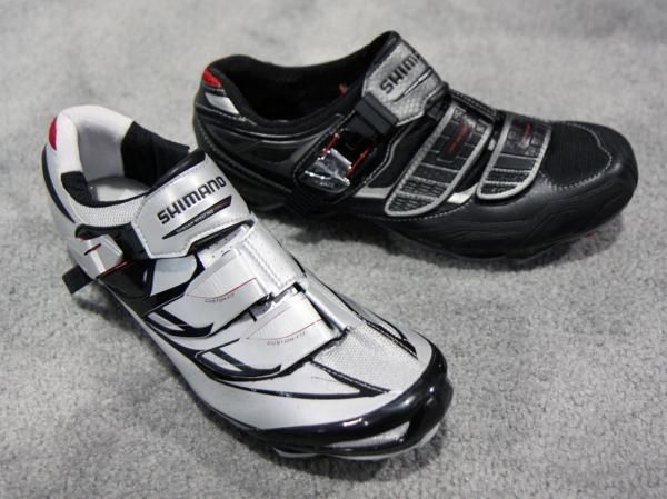 Shimano's new SH-M315 mountain bike shoe flagship (left) boasts lighterweight materials and a far more supple feel than before while the new SH-M240 sticks to more traditional heat-moldable materials for more durability.