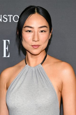 Greta Lee is pictured with a single-strand bun at at 2023 ELLE Women in Hollywood held at Nya Studios West on December 5, 2023 in Los Angeles, California.