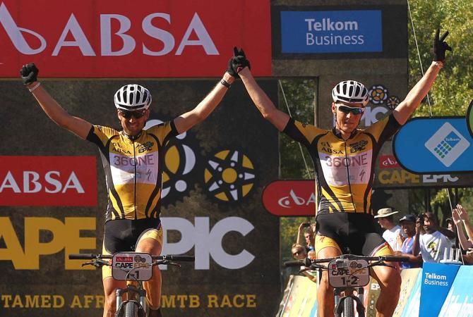 Christoph Sauser and Joroslav Kulhavy of Burry Stander-Songo celebrate after winning stage 5