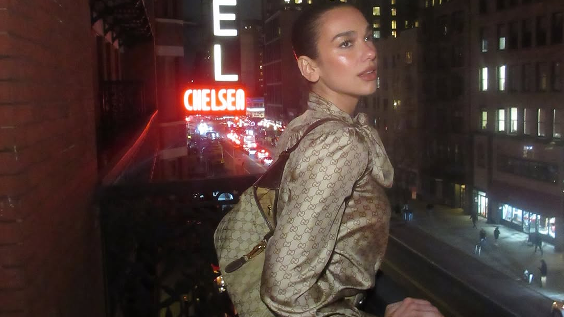 Dua Lipa hosted a Service95 book club event in a monogrammed Gucci Spring 2026 skirt set