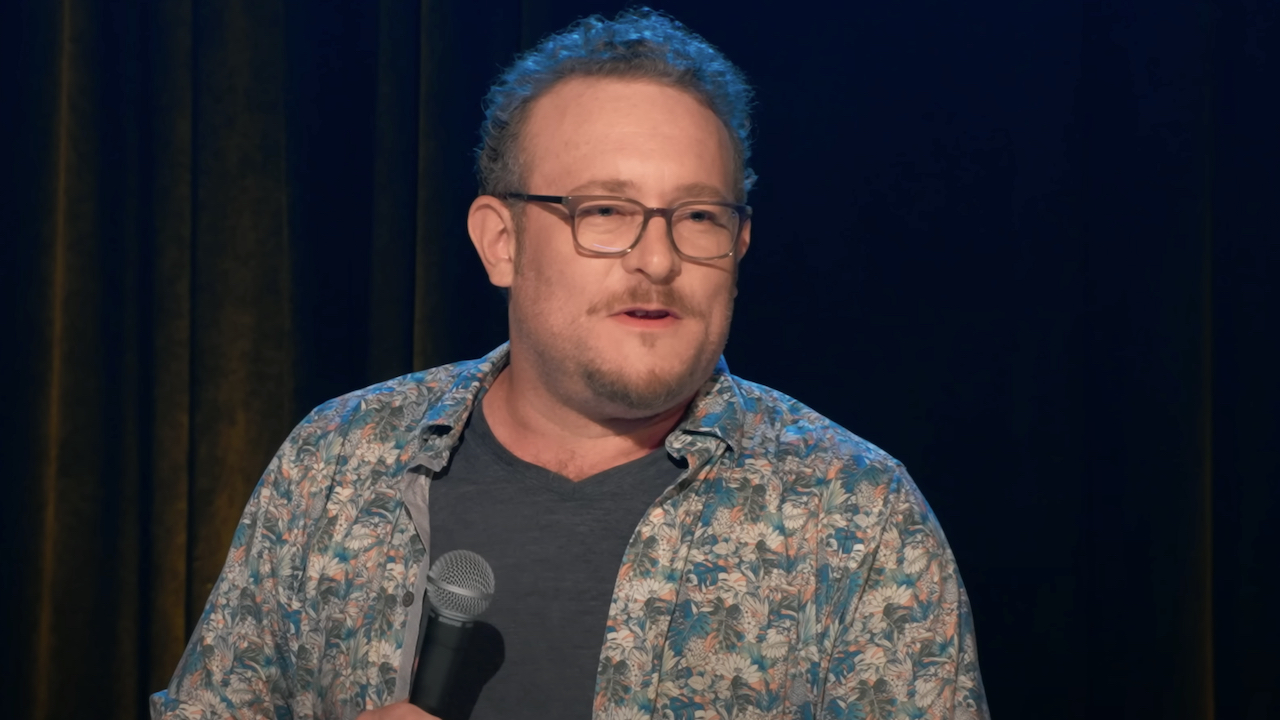 Screenshot of James Adomian telling a joke during a stand-up performance in James Adomian: Path of Most Resistance