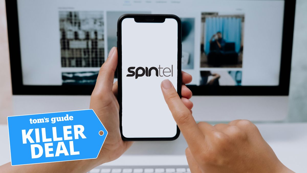 Hand pointing to phone with Spintel logo