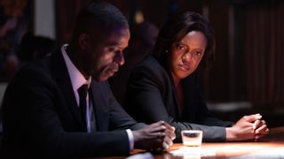 Sterling K. Brown and Krys Marshall as Xavier and Robinson at a bar in Paradise episode 5