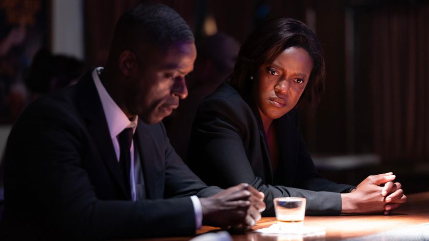 Sterling K. Brown and Krys Marshall as Xavier and Robinson at a bar in Paradise episode 5