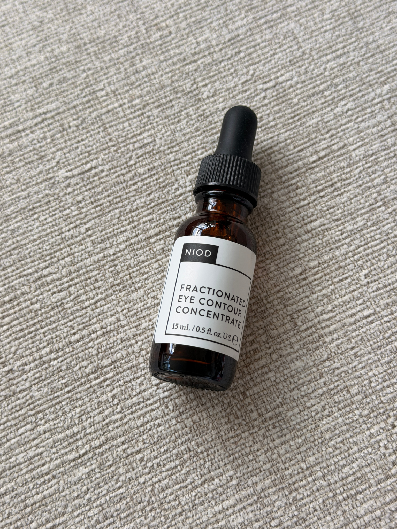 A bottle of NIOD's eye serum