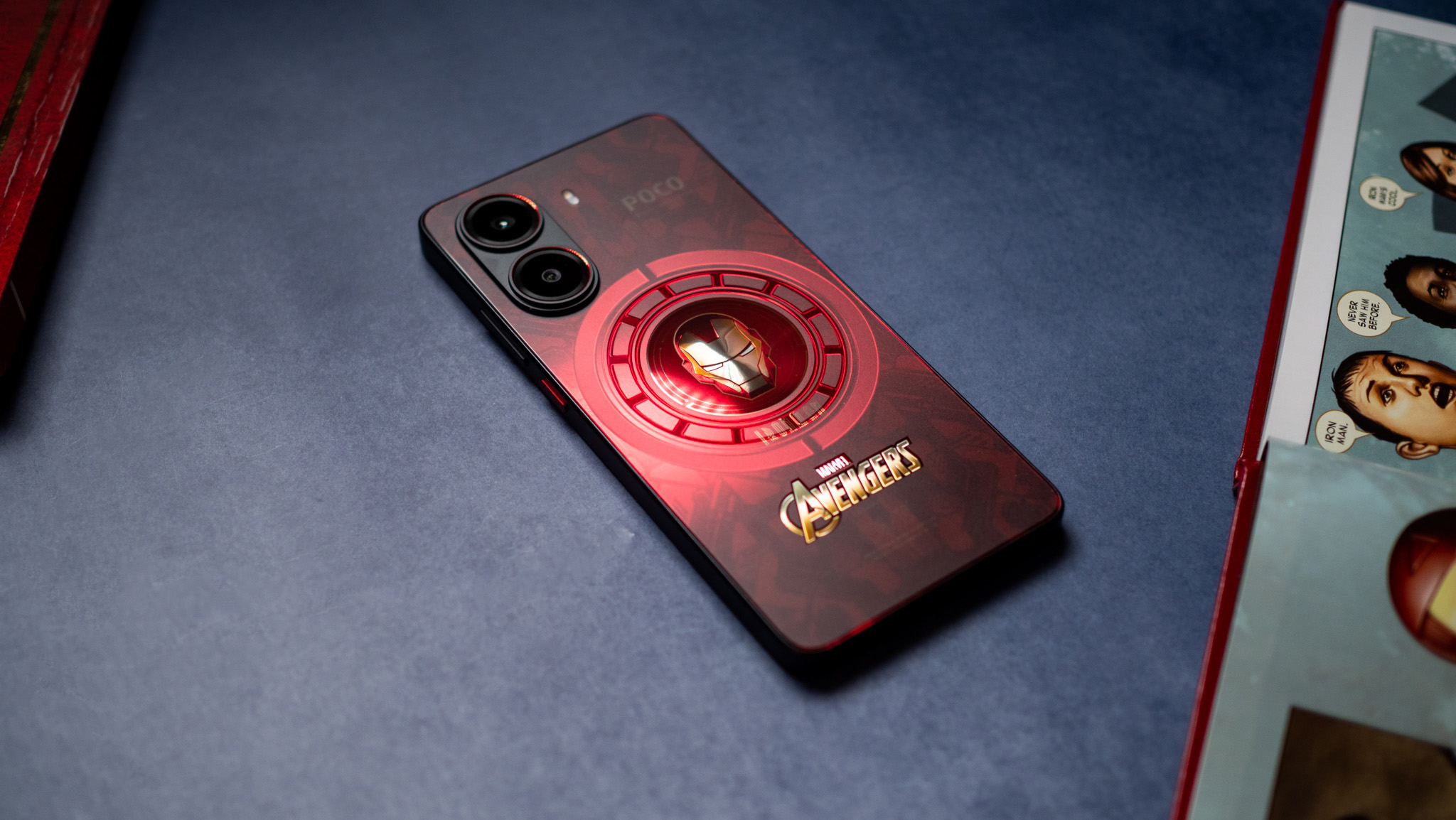 POCO X7 Pro Iron Man Edition back view next to comic