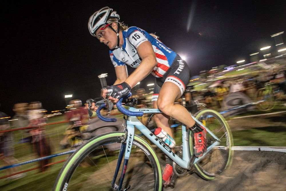 Katie Compton (Trek) stays on her bike over the stairs