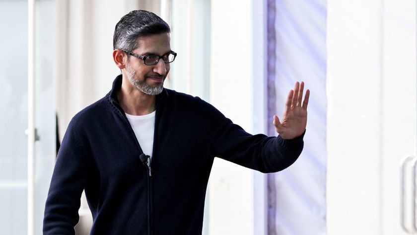 Google CEO Sundar Pinchai waving.